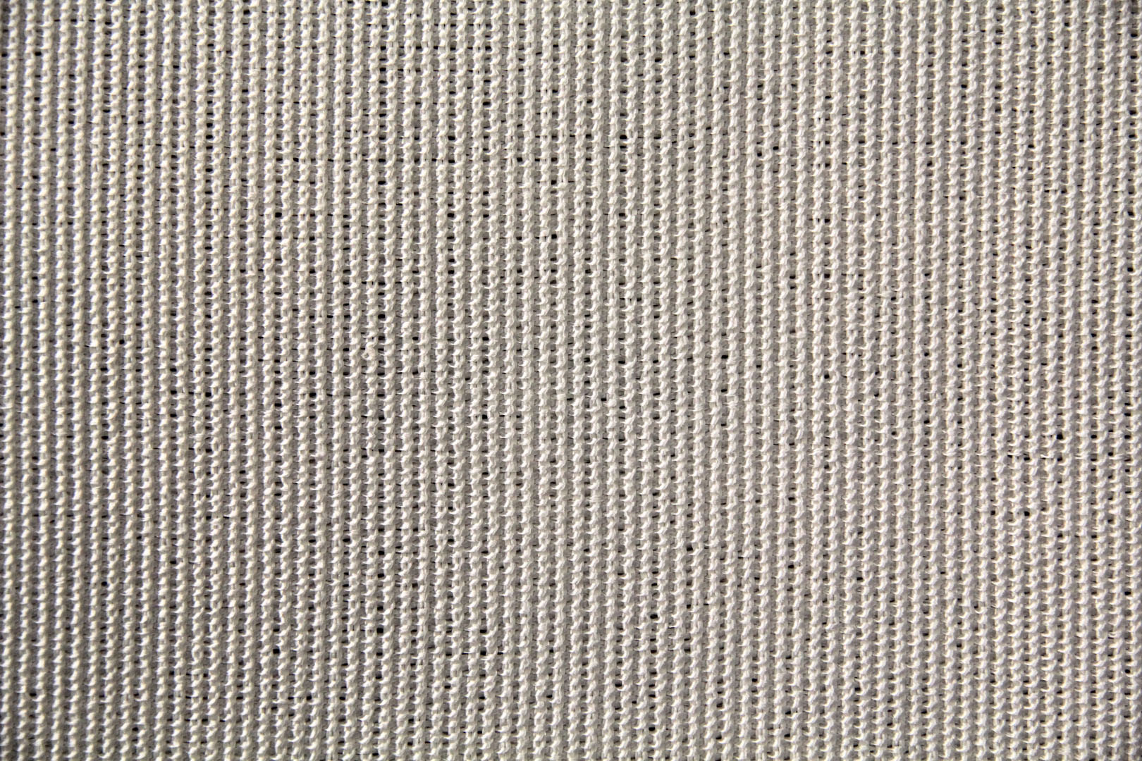 A close up of the fabric for a carpet.