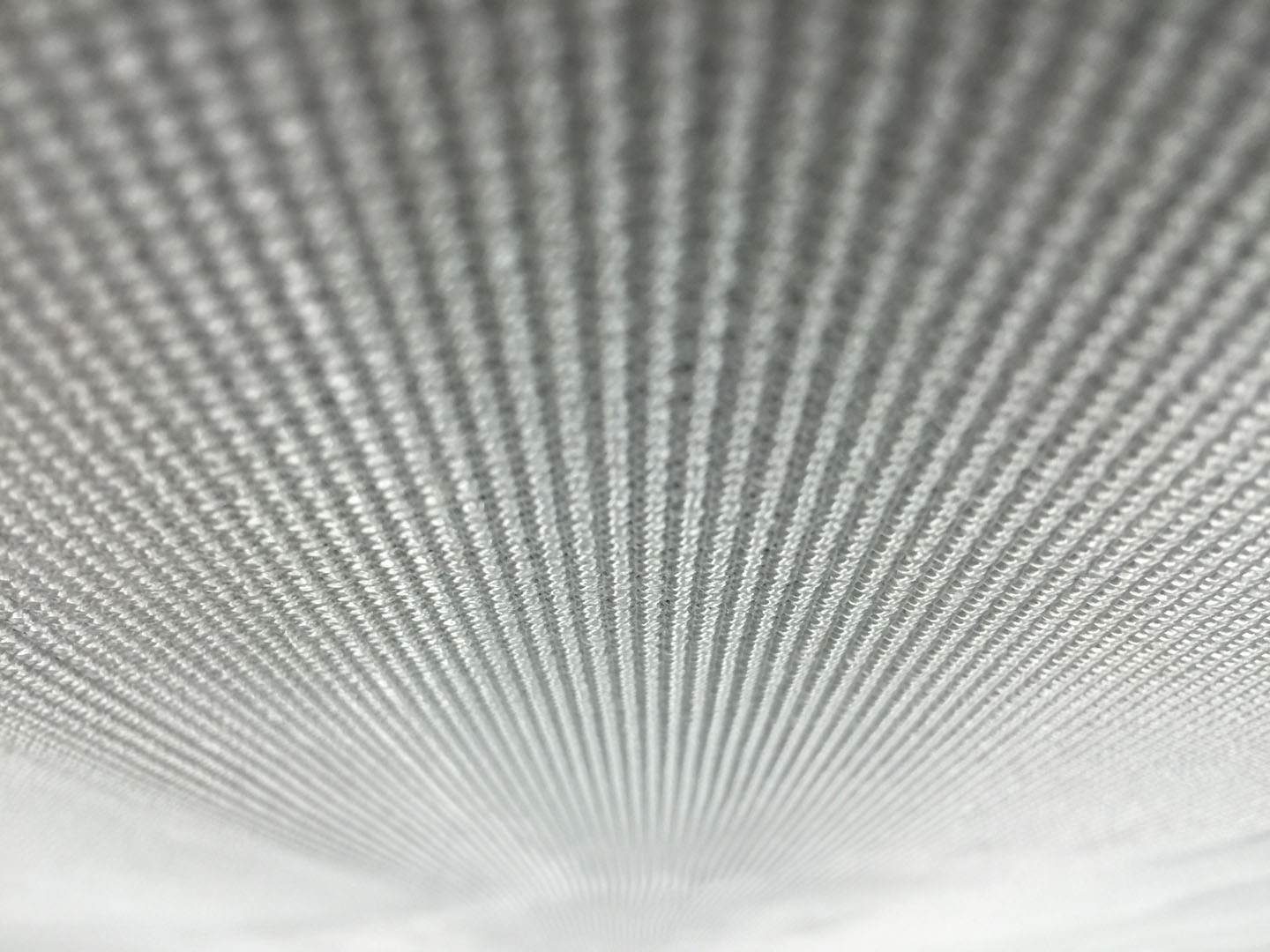 A white ceiling with many lines of light