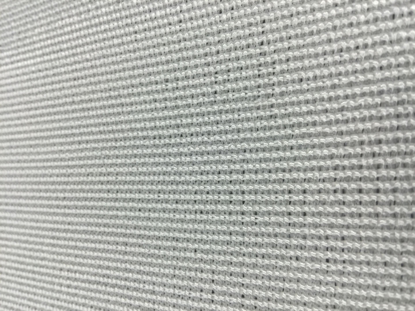A close up of the fabric on a wall