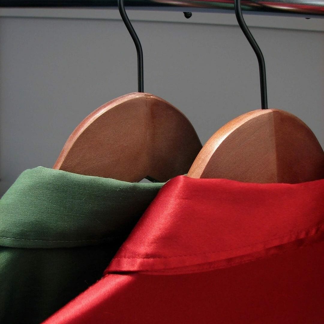 A red and green cloth hanging on the wall.